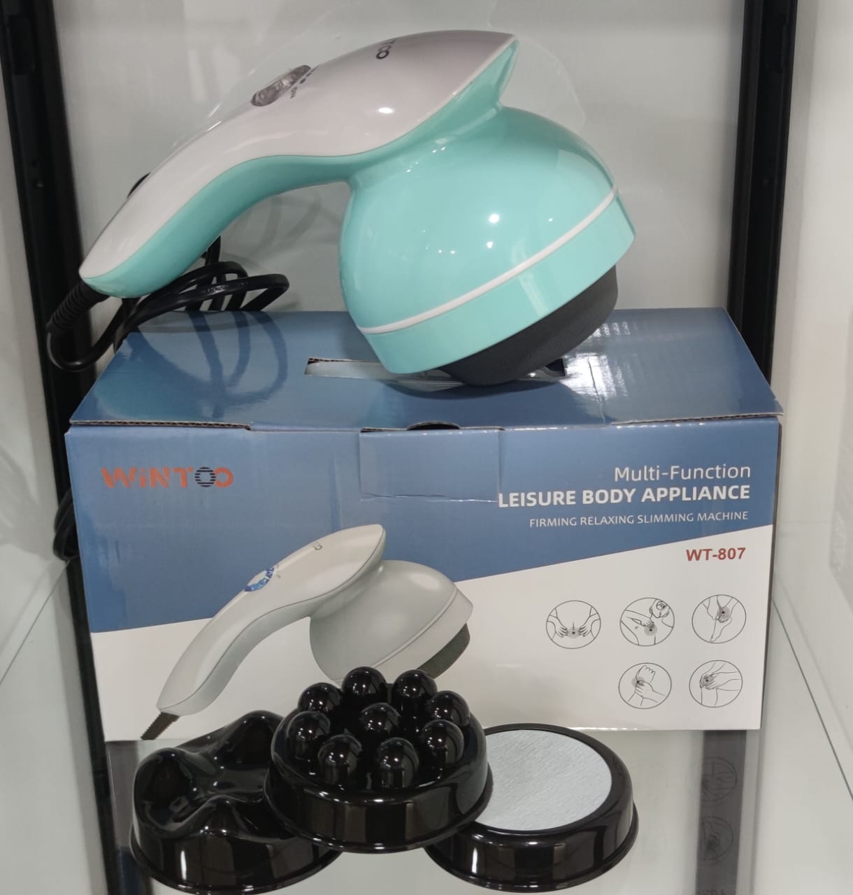 Wintoo WT-807 mint green electric full-body slimming massager with ergonomic design and vibration therapy